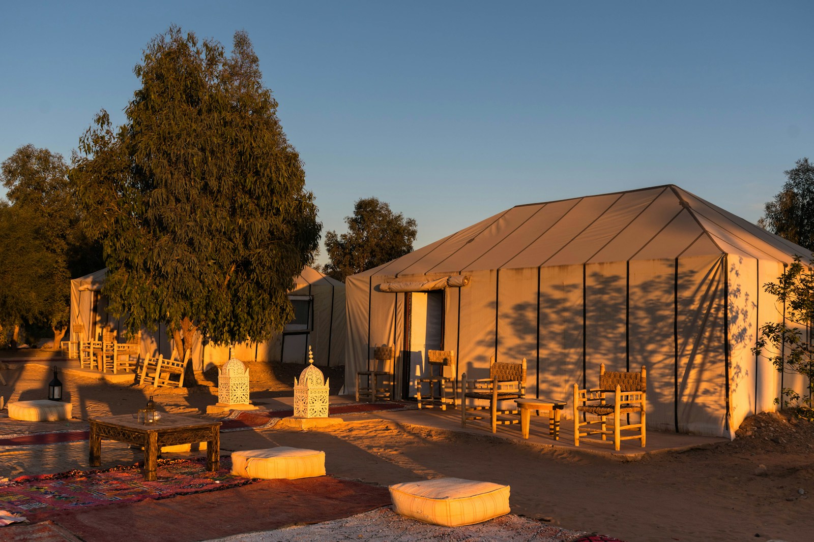 a tent set up in the middle of a field - 4-Day Desert Tour Fes to Marrakech