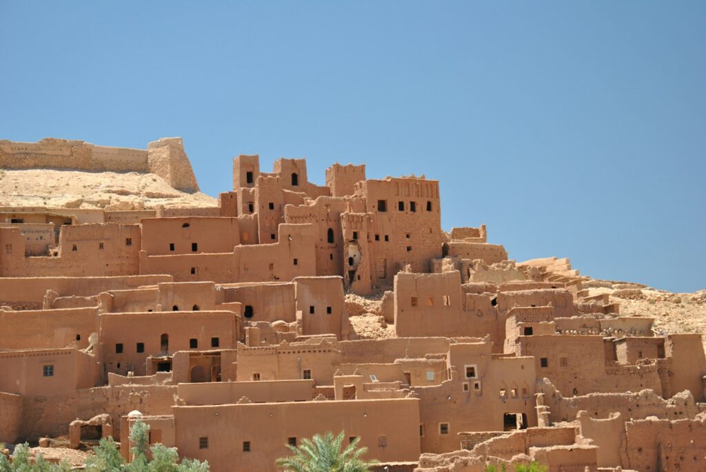 brown concrete building under blue sky during daytime - Day Trip from Marrakech to Aït Ben Haddou